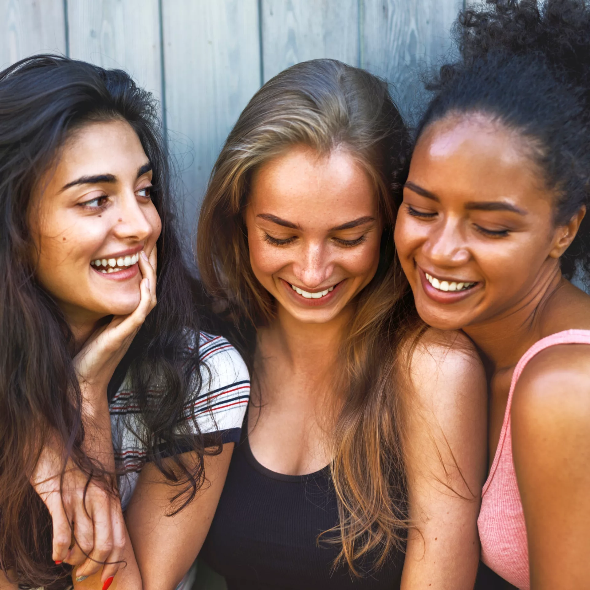 Close up shot of three young women having fun outdoors